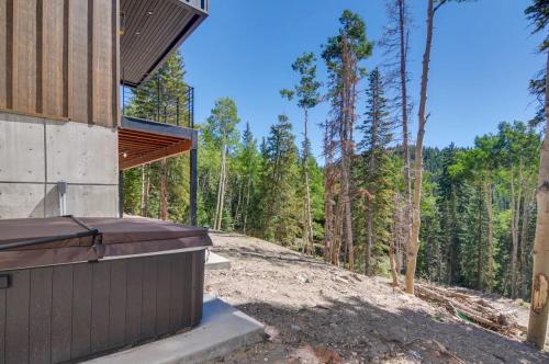 a house with a view of the woods at Alpine Mountain Escape in Beaver