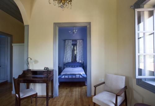 Säng eller sängar i ett rum på Chalantra Residence