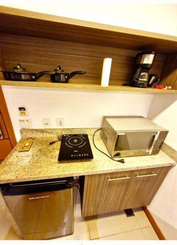 Dapur atau dapur kecil di APARTAMENTO GRAND MIDAS CONVENTION Samba Rio