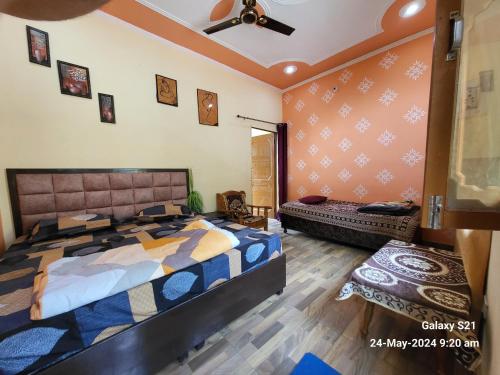 Ένα ή περισσότερα κρεβάτια σε δωμάτιο στο River View Home Stay