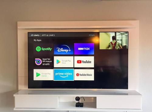 a television screen with a bunch of different apps at Condo in Palmas Del Mar - 5 min walk to Palmanova Plaza in Playa de Guayanes
