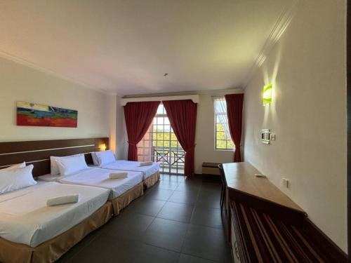 Кровать или кровати в номере Bella Vista Express Hotel