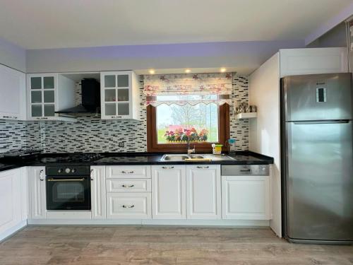 Dapur atau dapur kecil di İma Deluxe Villa