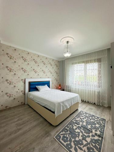 Katil atau katil-katil dalam bilik di İma Deluxe Villa