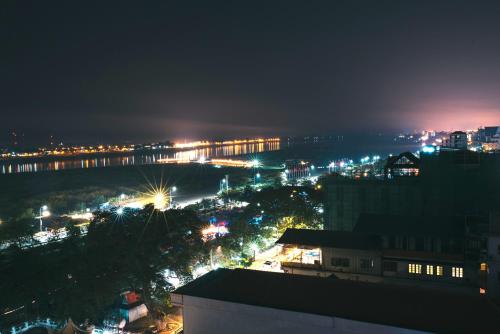 a view of a city at night with lights at V Hotel Vientiane in Vientiane