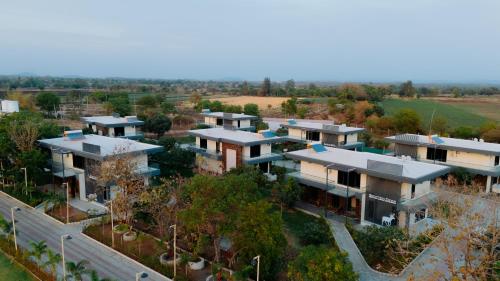 an overhead view of a house in a city at Daksh Eden Greenz -A Luxury Resort in Sasan Gir in Sasan Gir