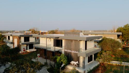 an aerial view of a house at Daksh Eden Greenz -A Luxury Resort in Sasan Gir in Sasan Gir