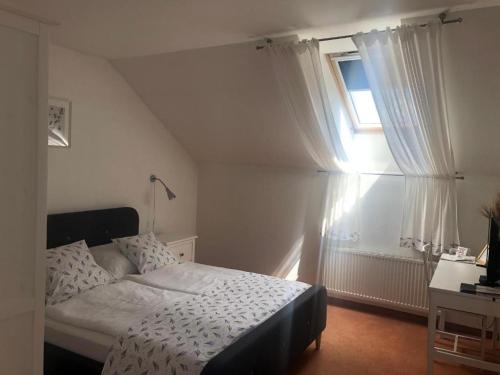 Posteľ alebo postele v izbe v ubytovaní Hotel Mlyn