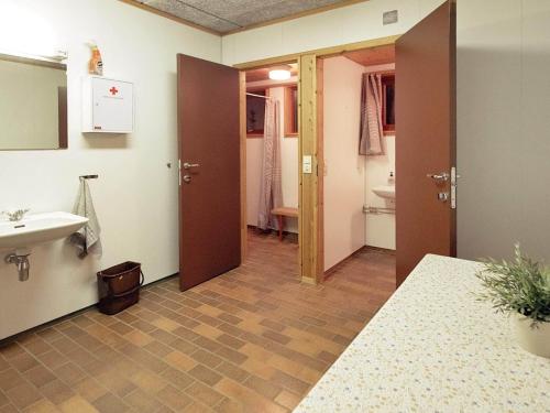 a bathroom with a sink and a toilet at 19 person holiday home in Jøsenfjorden-By Traum in Gullingen