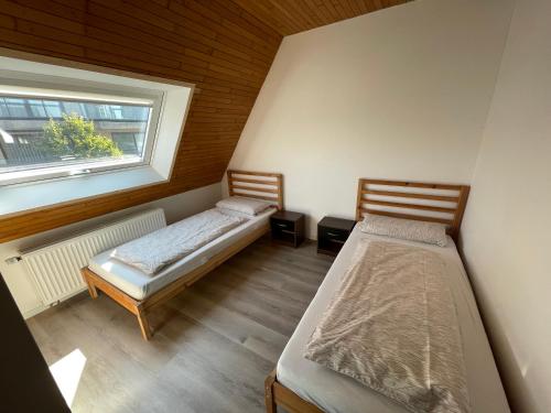Postel nebo postele na pokoji v ubytování Gasthaus A&S - Oostende - Beach