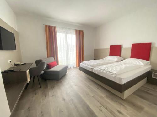 Postel nebo postele na pokoji v ubytování Simon - Hotel & Café