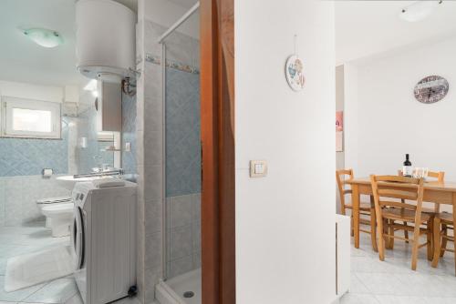 Ванная комната в Casa Vacanza Cala Mariolu