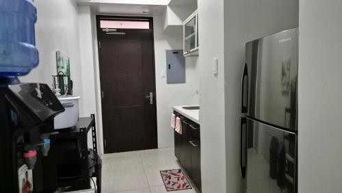 Kuchyň nebo kuchyňský kout v ubytování Pico De Loro Condo Unit