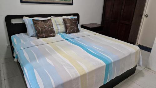 Postel nebo postele na pokoji v ubytování Pico De Loro Condo Unit