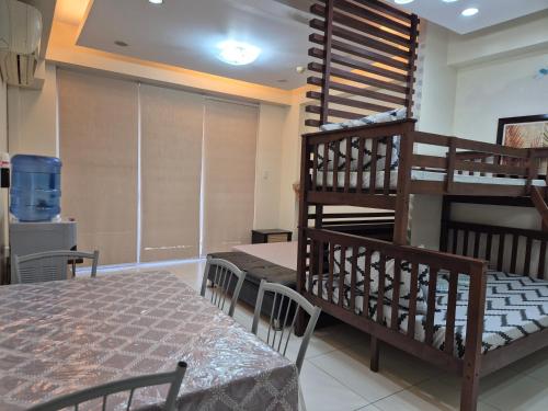 Postel nebo postele na pokoji v ubytování Pico De Loro Condo Unit