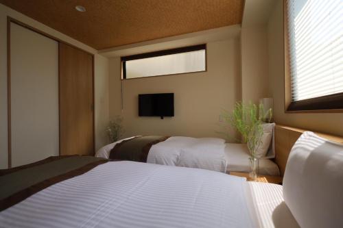 Xcellent Hotelにあるベッド