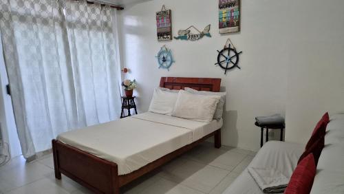 Postel nebo postele na pokoji v ubytování Pico De Loro Condo Unit