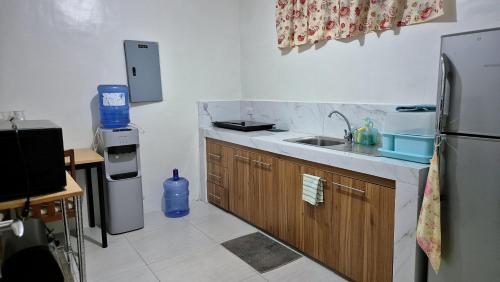 Kuchyň nebo kuchyňský kout v ubytování Pico De Loro Condo Unit