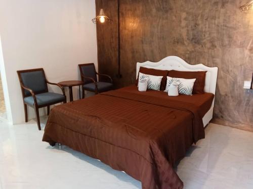 Postel nebo postele na pokoji v ubytování Khlong Thom Resort