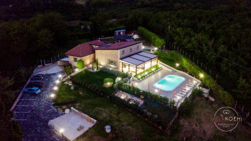 an aerial view of a house with a swimming pool at Villa Noemi in Montefredane