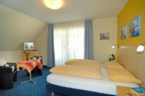 Postel nebo postele na pokoji v ubytování Appartementhaus Ostseeresidenz