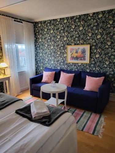 Posezení v ubytování Hotell Floras Trädgård
