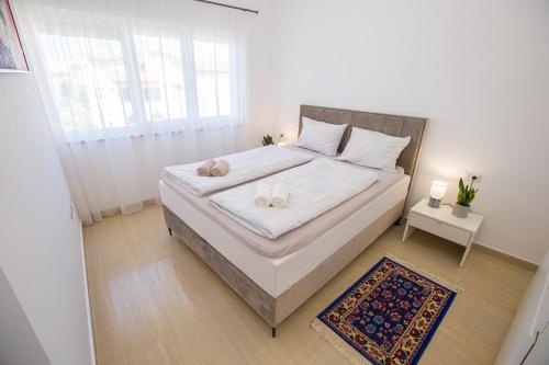 Postel nebo postele na pokoji v ubytování LUNA