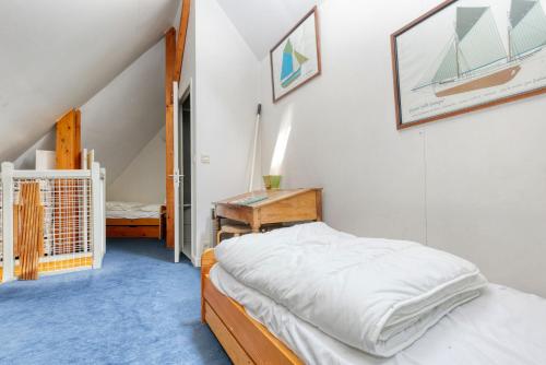 Postel nebo postele na pokoji v ubytování Appartement spacieux face mer