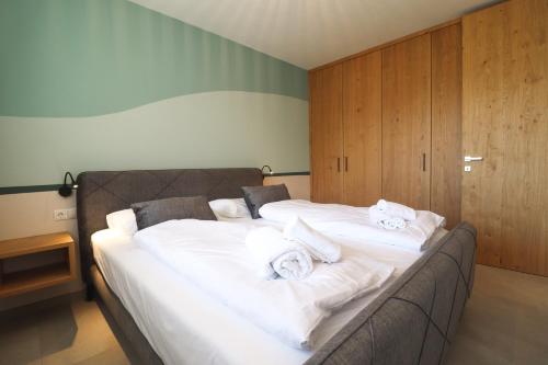 Postel nebo postele na pokoji v ubytování Residence Montani