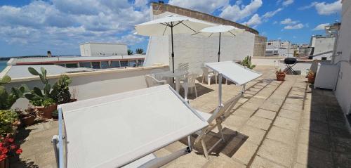 A balcony or terrace at Island Apartment Porto Cesareo