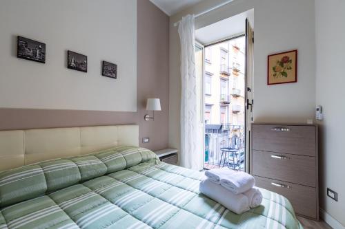 Posteľ alebo postele v izbe v ubytovaní Napoli Heartbeat by Napoliapartments
