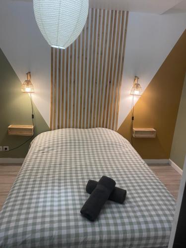 Postel nebo postele na pokoji v ubytování Appartement à Montigny