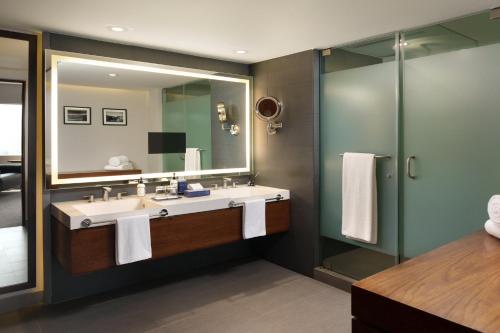 a bathroom with a sink and a mirror at Presidente InterContinental Mexico City by IHG in Mexico City