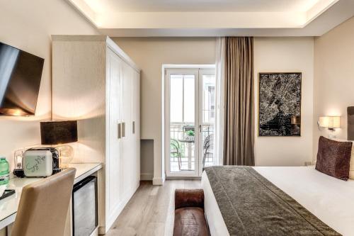 Postel nebo postele na pokoji v ubytování Hotel Sorrento City