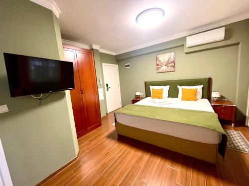 Ένα ή περισσότερα κρεβάτια σε δωμάτιο στο Art Green Boutique Hotel
