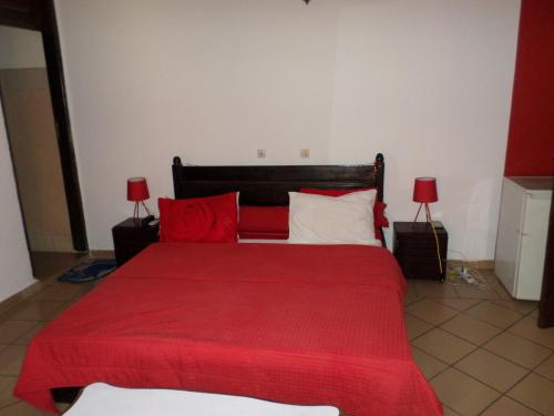 Llit o llits en una habitació de Seven Residence