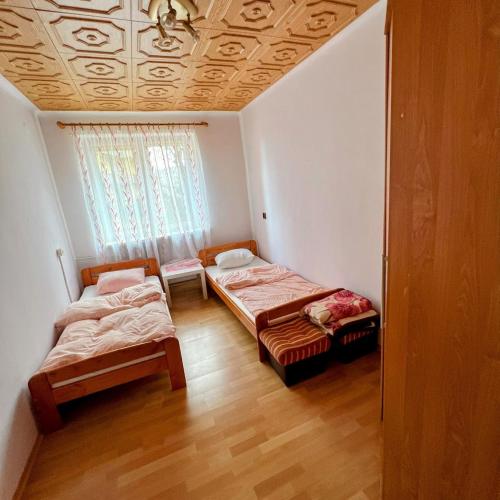 Postel nebo postele na pokoji v ubytování Apartament Centrum