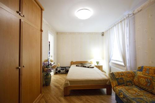 Кровать или кровати в номере Žubītes 8