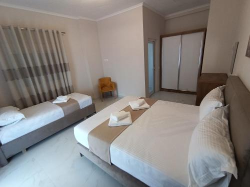 Postel nebo postele na pokoji v ubytování Gusto di Casa Rooms