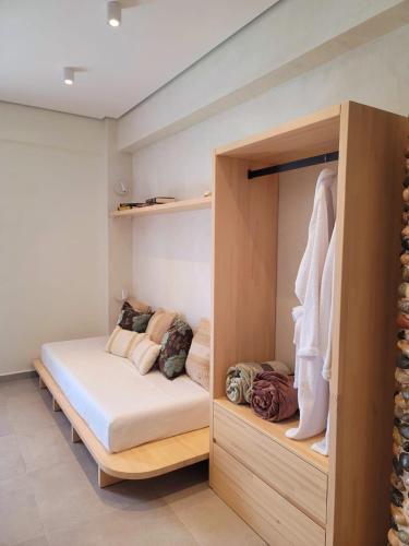 a bedroom with a bed in a room at Artis Blue Relax in Himare