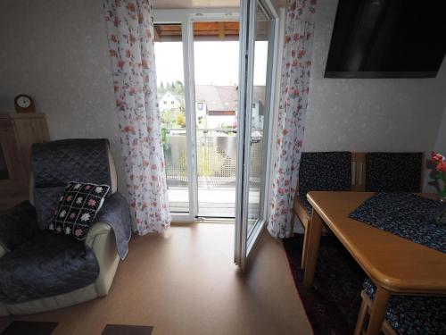 Ruang duduk di Ferienwohnung "In der Argenschleife"