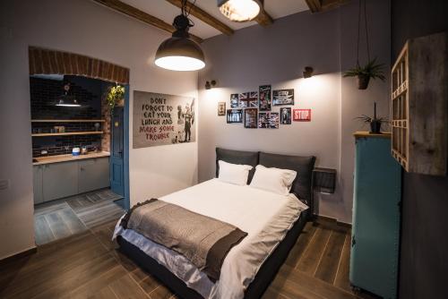 a bedroom with a large bed in a room at Casa Verde - Brasov Homes in Braşov