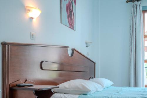 Ένα ή περισσότερα κρεβάτια σε δωμάτιο στο Patras Rooms est 1990