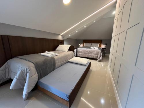 Postel nebo postele na pokoji v ubytování Loft Dona Clara 202 Centro de Pomerode