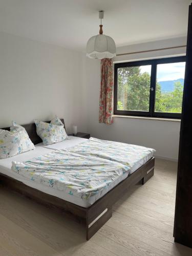 Ένα ή περισσότερα κρεβάτια σε δωμάτιο στο Ferienhaus Siedenberg