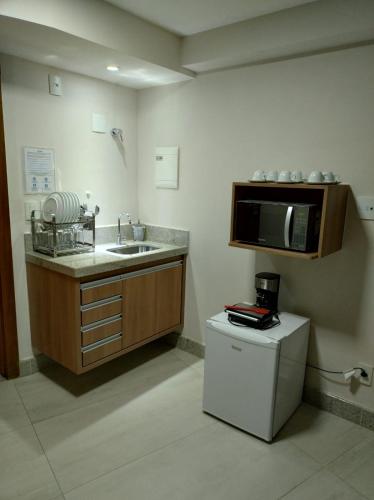 Dapur atau dapur kecil di Vista Azul Apart Hotel Suites