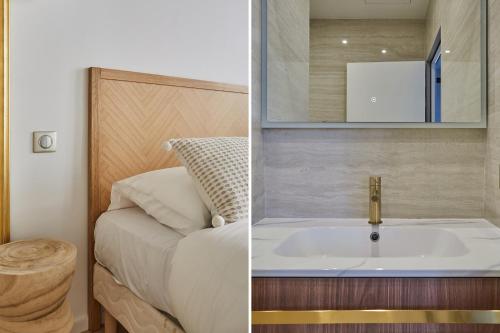 a bathroom with a bed and a sink and a mirror at Eiffel Tower Apartment/Invalide by Studioprestige in Paris