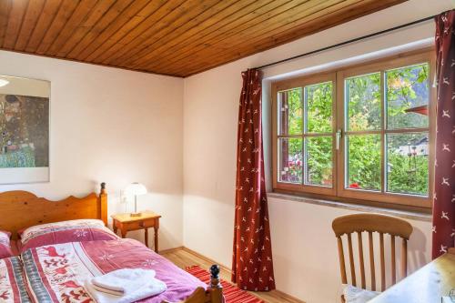 Ένα ή περισσότερα κρεβάτια σε δωμάτιο στο Landhaus Lucia