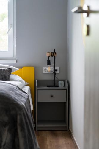 Katil atau katil-katil dalam bilik di Balatonic Lemon apartmanház