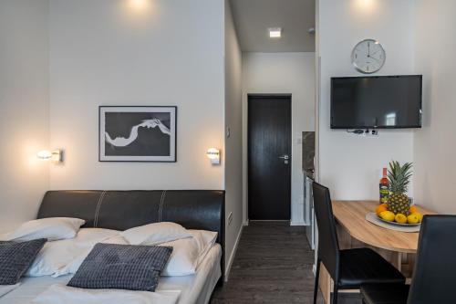 Katil atau katil-katil dalam bilik di Balatonic Lemon apartmanház